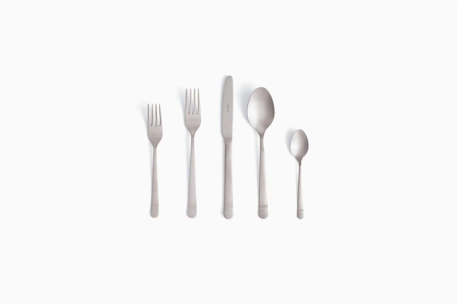 Julie favors the Almoco Silver Stainless Flatware made by a third-generation, family-run business in Portugal; $data-src=