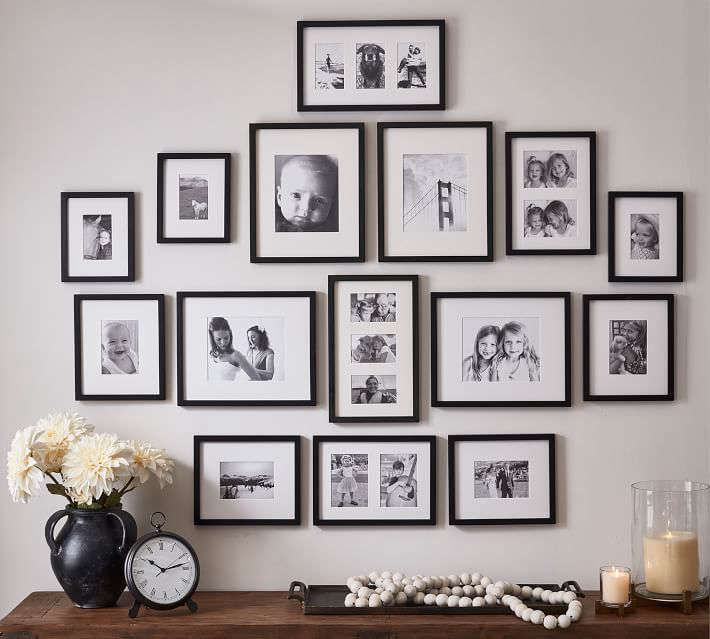 The Wood Gallery Frames in a Box is a set of  frames in Black, Espresso, Modern White, Graywash; $449.50 at Pottery Barn.