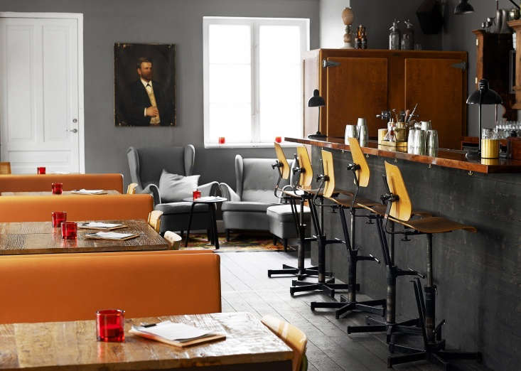 choose your perch–an equally inviting bar with gray walls, black tables, 20