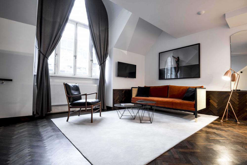 The Etage Suite, complete with a Gubi Grasshopper Floor Lamp.