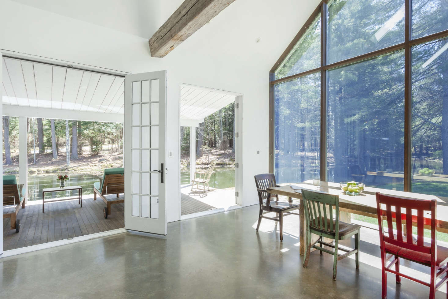The kitchen and dining room open out onto the floating porch.