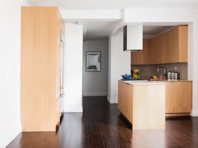 an open kitchen in murray hill: a beautifully appointed modern kitchen, open to 75