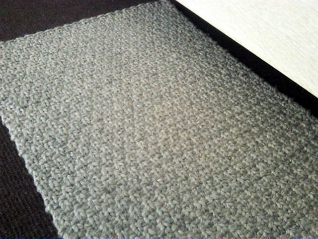 Leviticus Rug: Hand-knitted rug of wool, linen, and bamboo rayon.