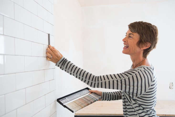 Amanda Pays picking tile grout Laure Joliet Remodelist