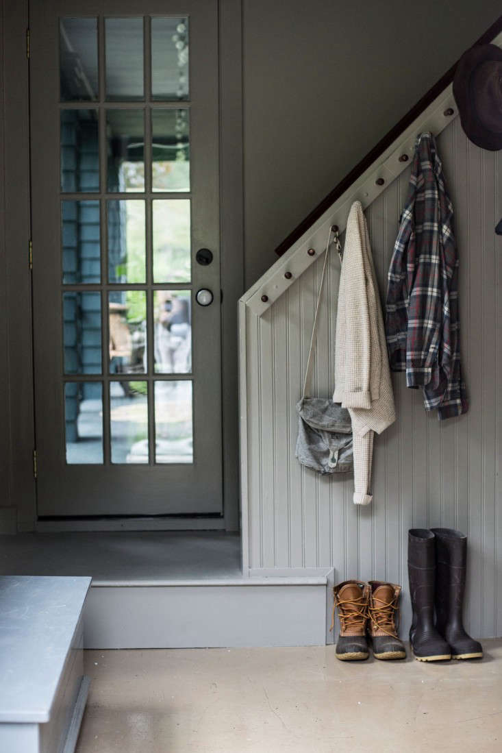 In this historic Catskills house, Jersey Ice Cream Co. uses a combination of beadboard and Shaker peg rails to create a height-enhancing vertical element as well as an intriguing design element. (See A Country House Reinvented by Jersey Ice Cream Co.) Photograph by Beth Kirby of Local Milk.