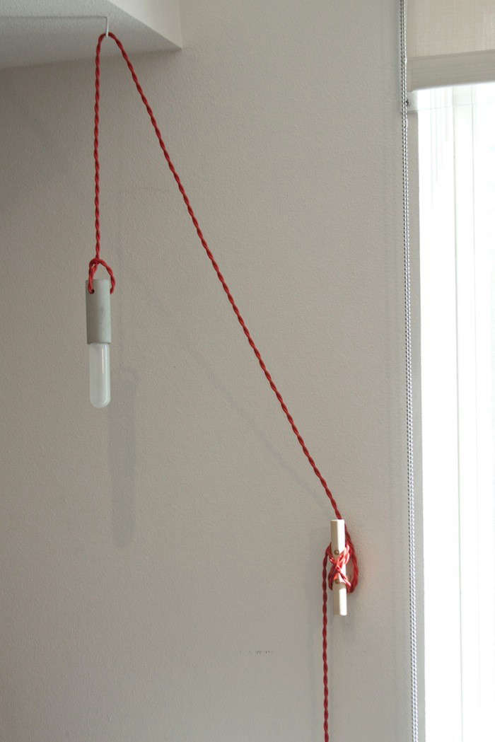 the concrete pendant light, shown here in red with a t \10 light bulb, is a han 17