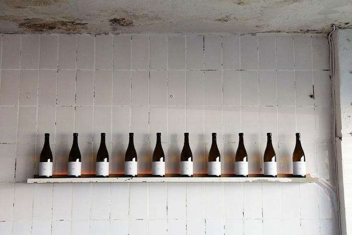 fiskbars tiled wall wine bottles