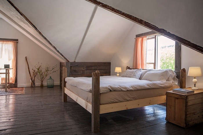 the king size bed is made from reclaimed wood. 27