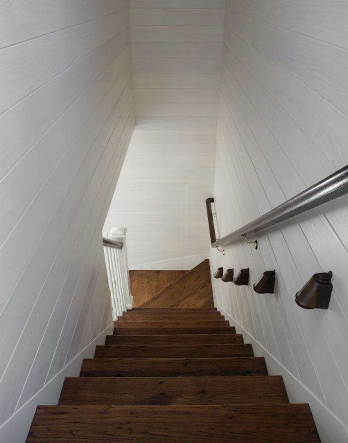 700 wettling architects shelter island worn stair with white painted interior siding