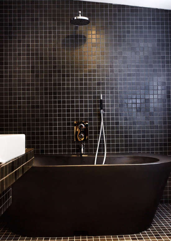 black tub black tiles