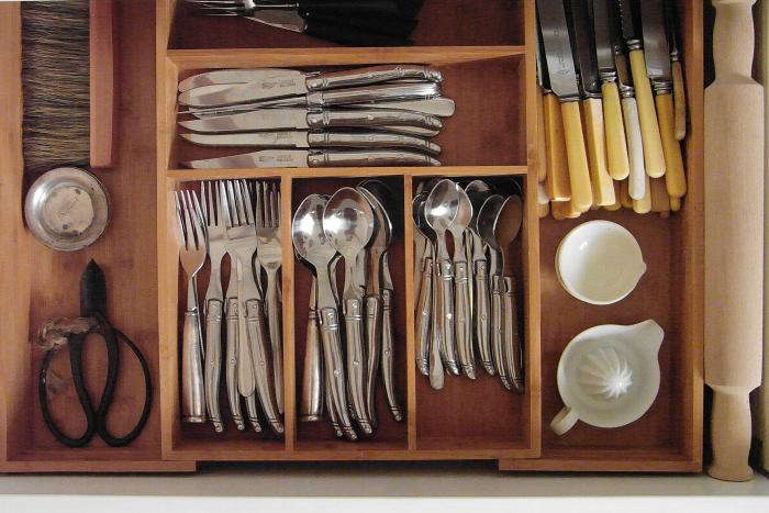 in a well organized utensil drawer, vintage finds are grouped by use or by fini 22