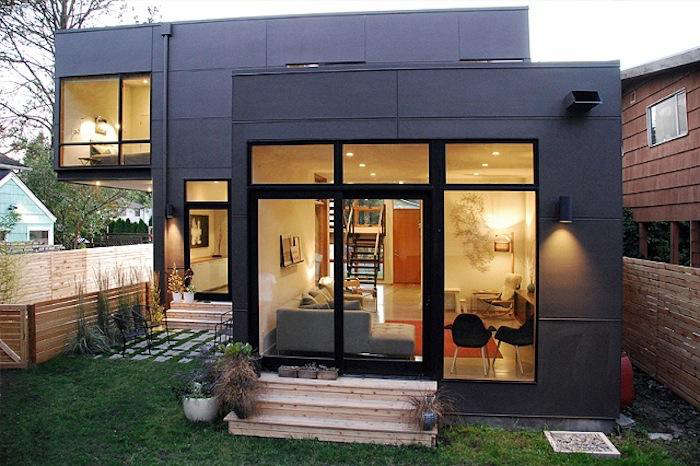 700 malboeuf bowie nighttime backyard modern house