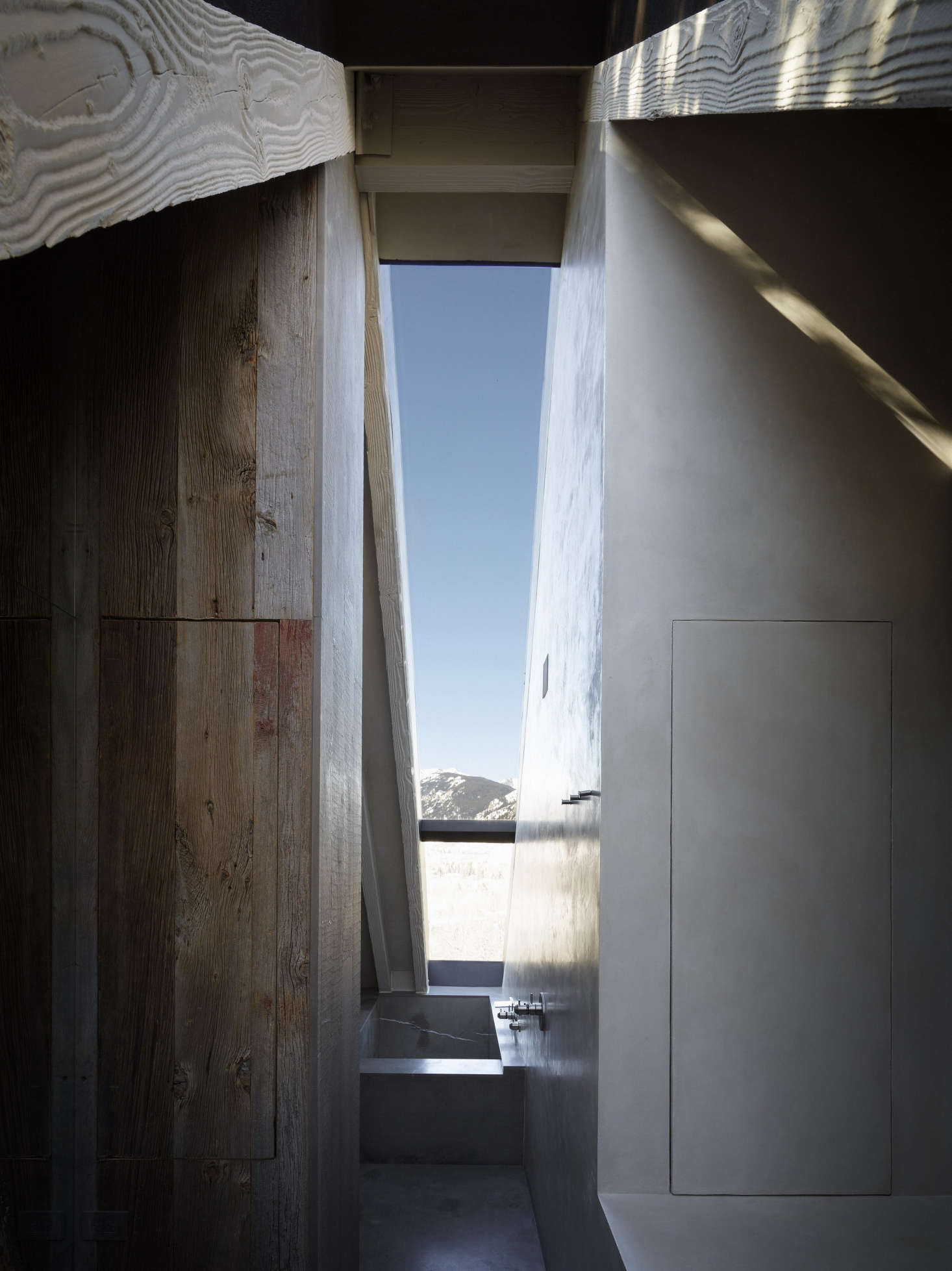 A dramatically positioned bathtub.