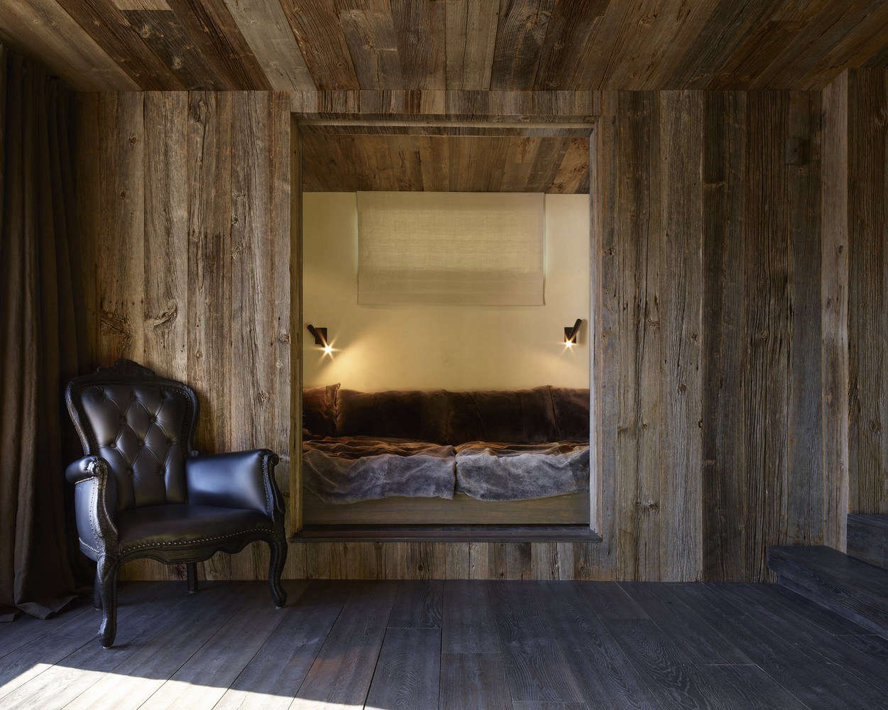 A bed carved into a wall.