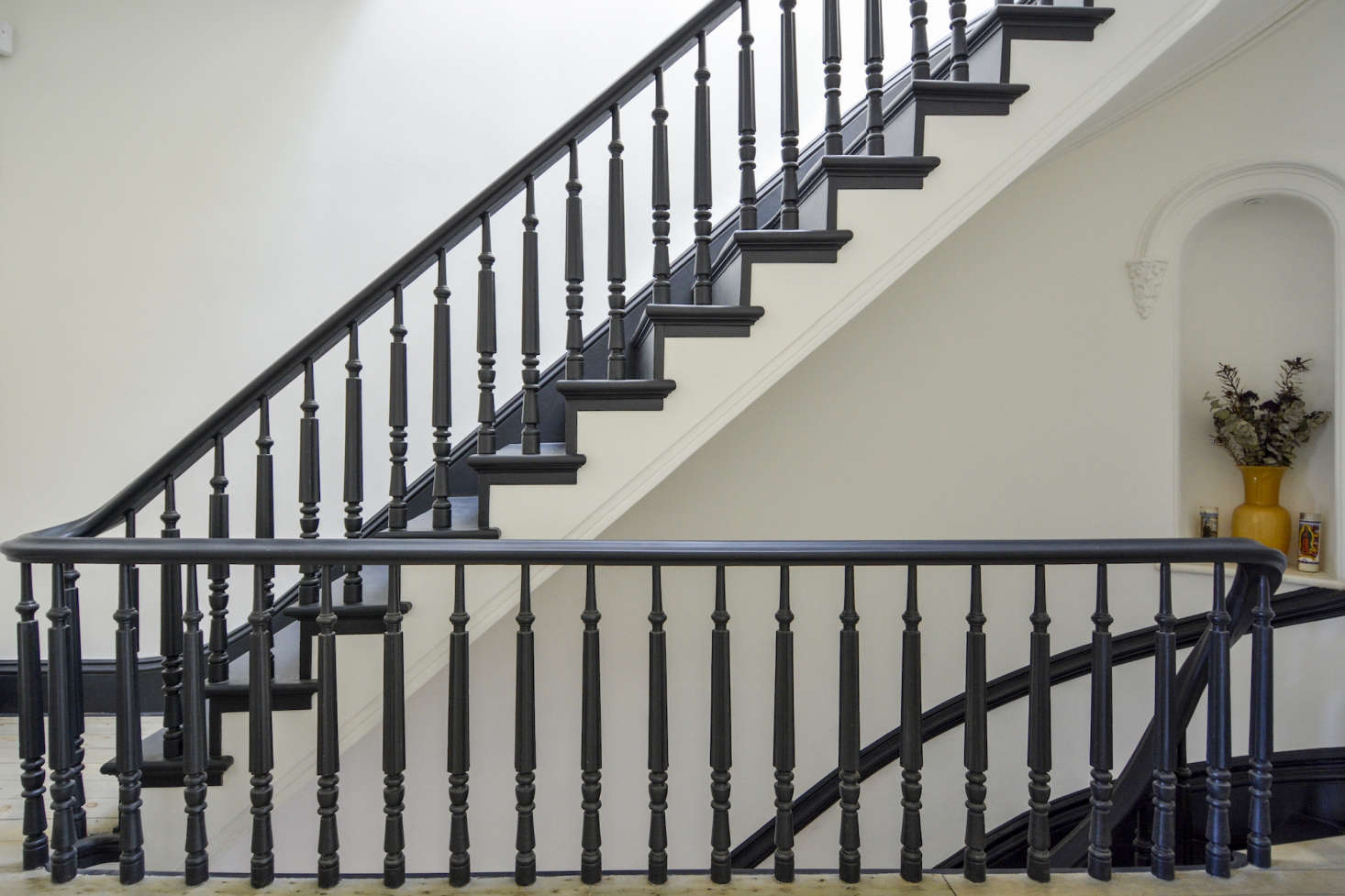A staircase painted in Benjamin Moore