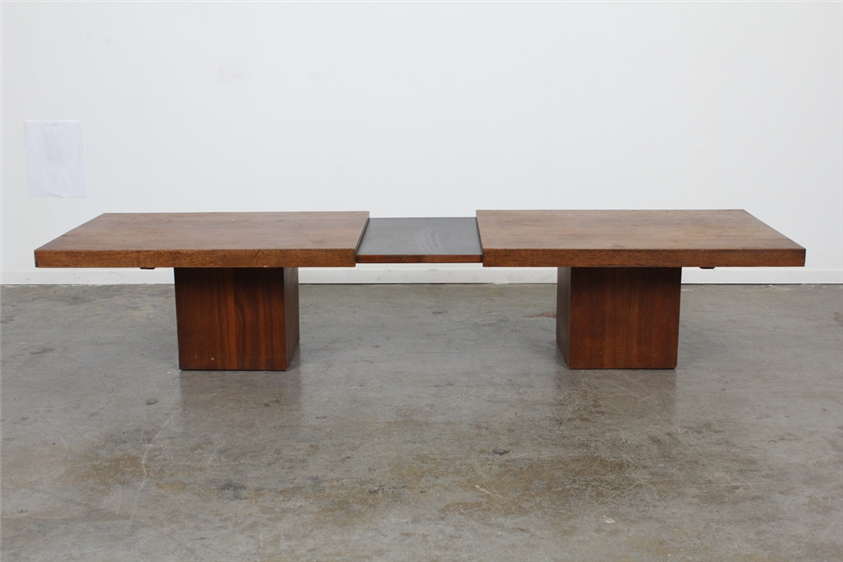 this john keal expanding coffee table is made of walnut and black laminate 25