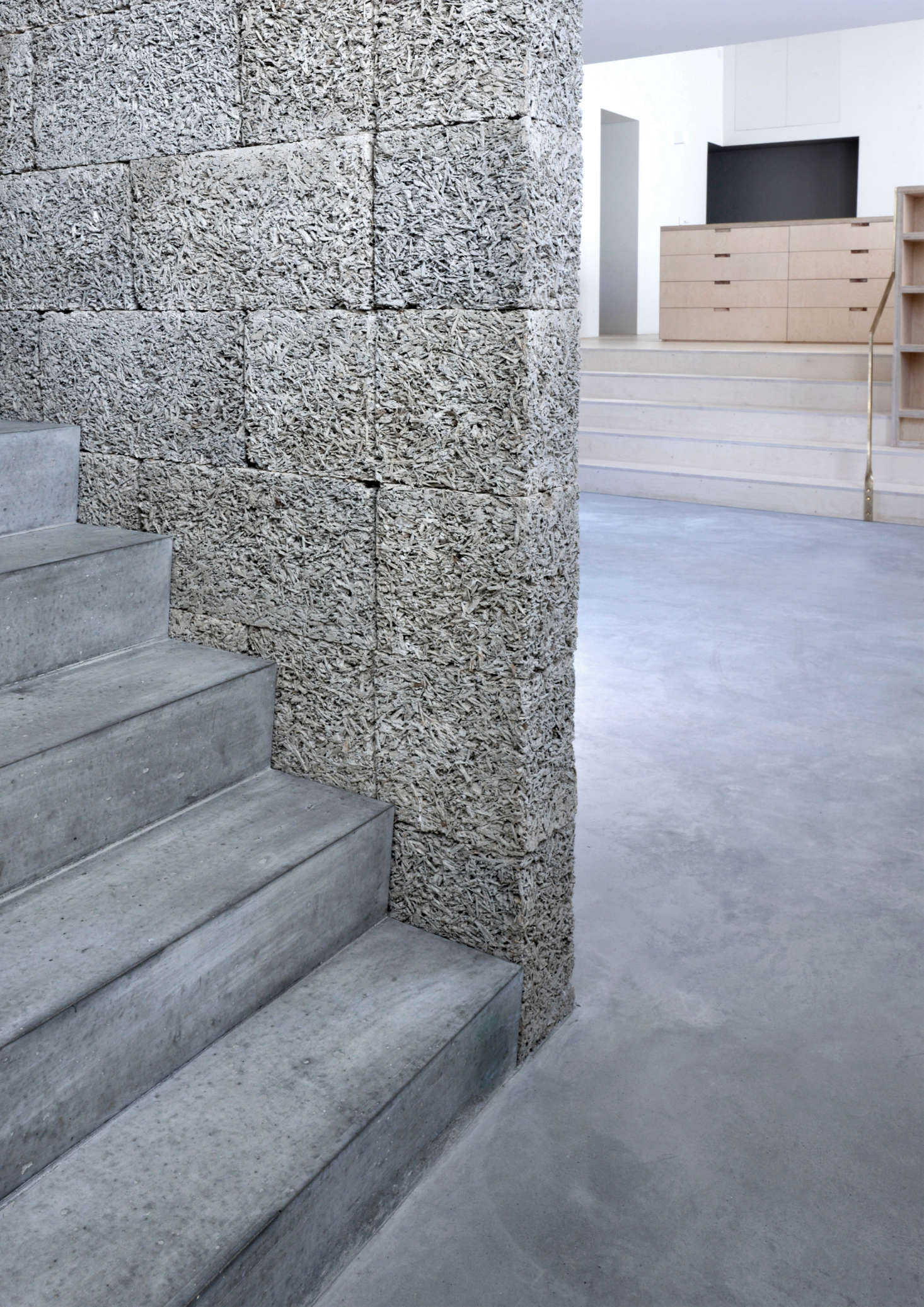 The stair wall is made of dry-stacked Durisol Wood-Cement Walling Units.