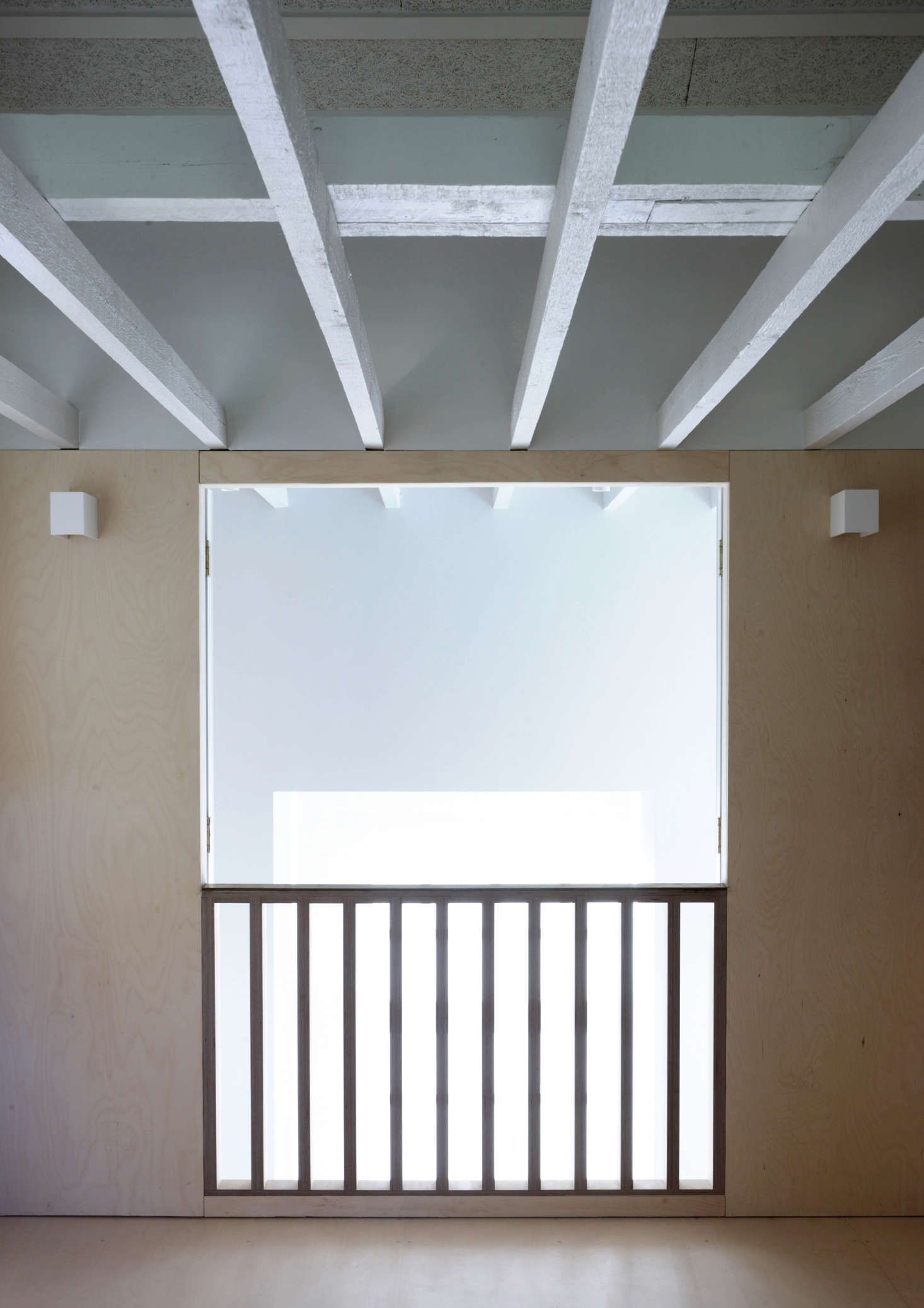 A view from the bedroom balcony. Note the exposed wood-cement lining in the roof.