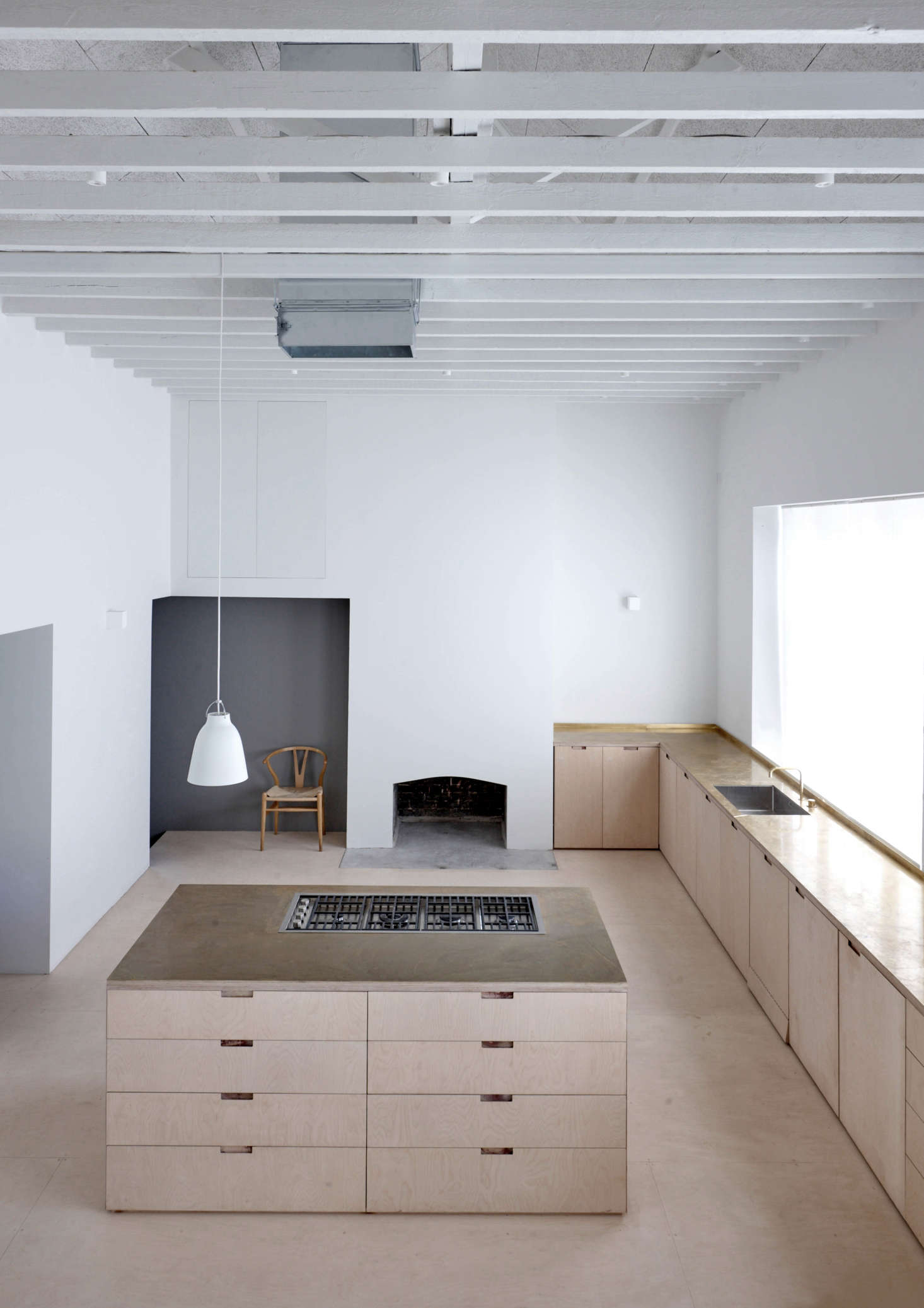 Viewed from the upstairs bedroom, the kitchen is 