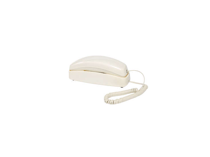 a vintage \1960s style slimline phone in ivory is \$49.95 at the vermont countr 34