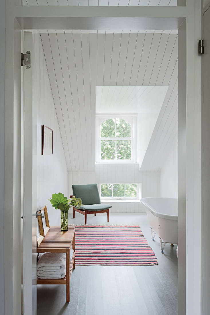 a scandi style attic bath in brooklyn gets a dose of color via a striped r 17