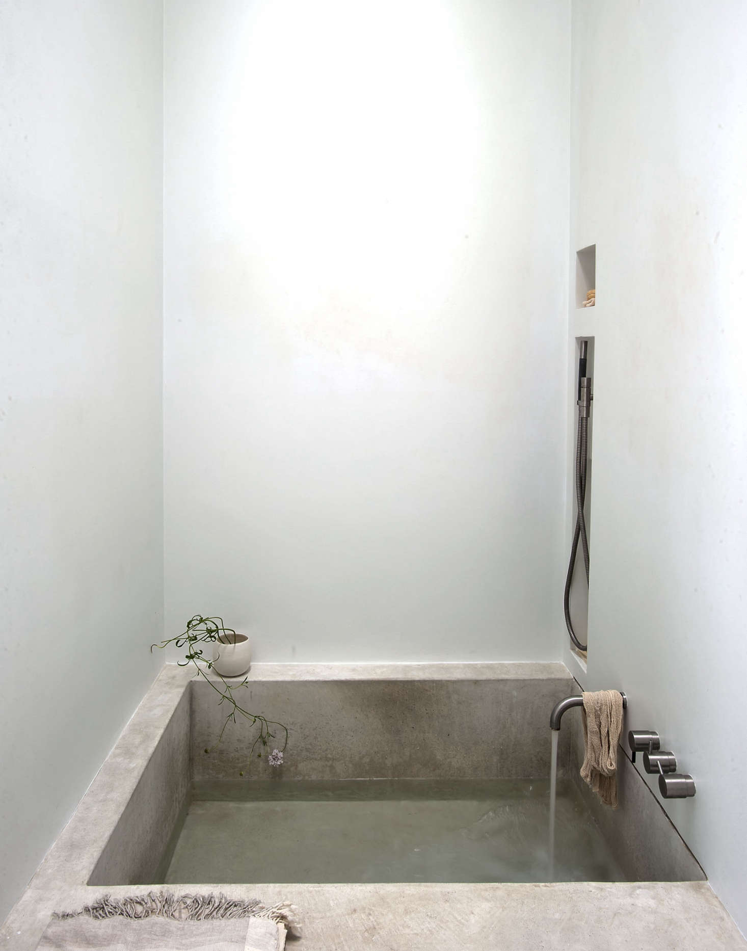 And, if you feel moved, concrete can also make a sculptural bath, as seen here in World’s Tiniest Spa Bath: A Grecian-Inspired Guest Suite in LA. Photograph by Matthew Williams for Remodelista.