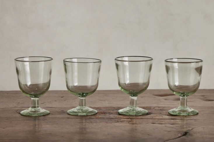 individually handblown in the michoacán, stemmed glasses are \$\18 each from n 18