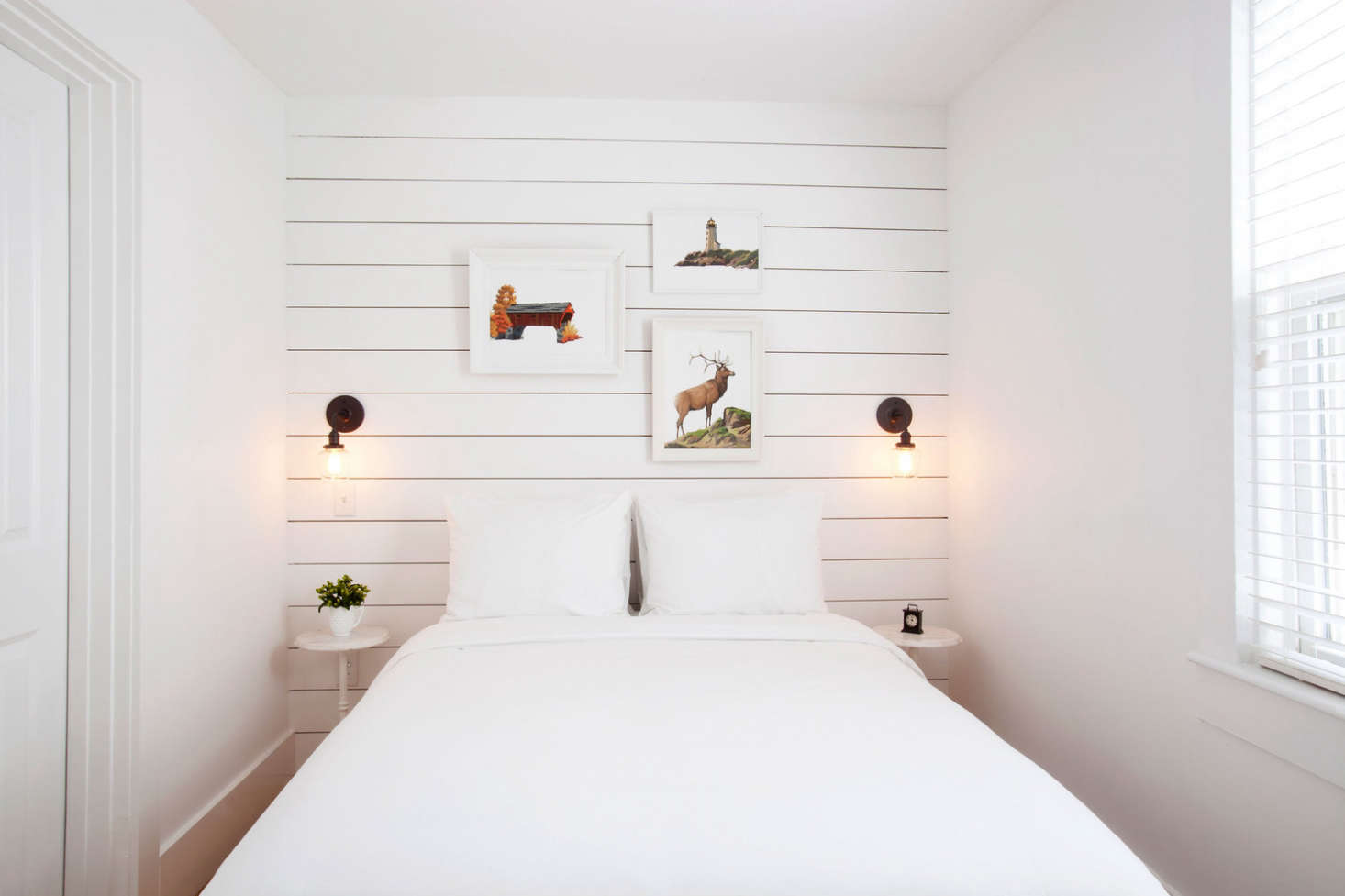 A shiplap-paneled accent wall at Salt House Inn in Provincetown, situated in a historic cedar-shingled building—see The Hamptons Come to Cape Cod.