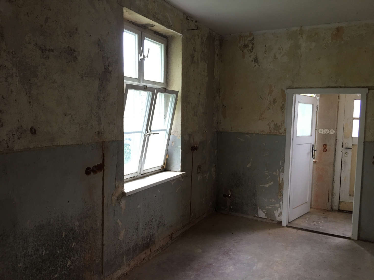 The space came with atmospheric two-toned walls, replaced windows, and windowed doors—and nothing more. Go to Our Food Stories for a detailed accounting of the makeover, plus the plum cake recipe.