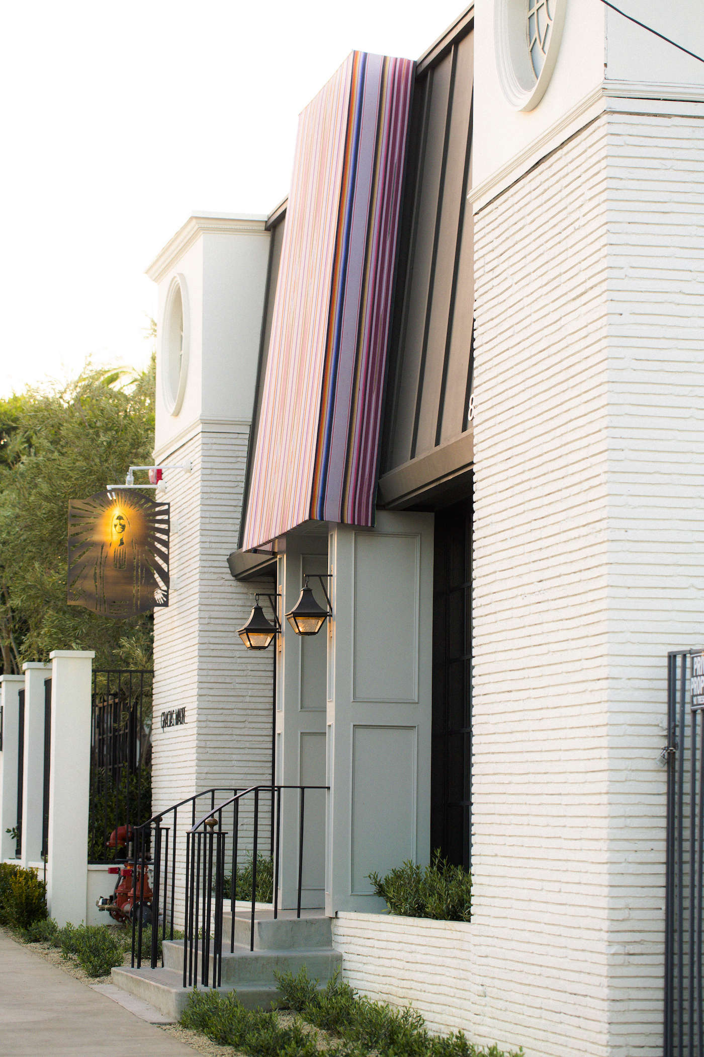 exterior of gracias madre west hollywood la striped awning 27