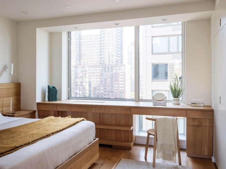 in a compact apartment by new york based workstead, custom oak millwork creates 28