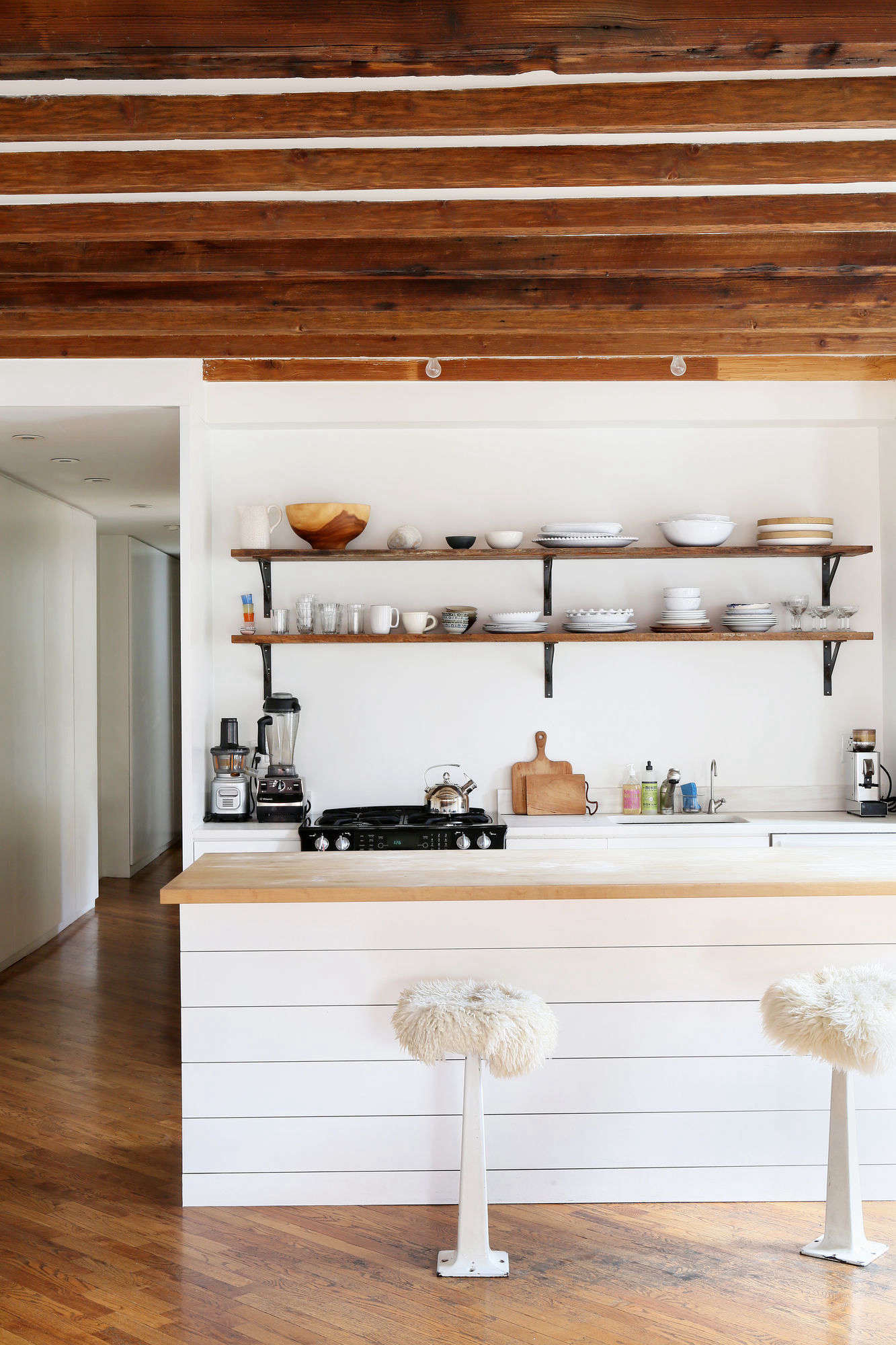 Daphne Javitch replaced all but the new black range in her New York apartment. See The Healthful Apartment: A Wellness Expert Finds Serenity on the Lower East Side. Photograph by Sarah Elliott, courtesy of Rip & Tan.