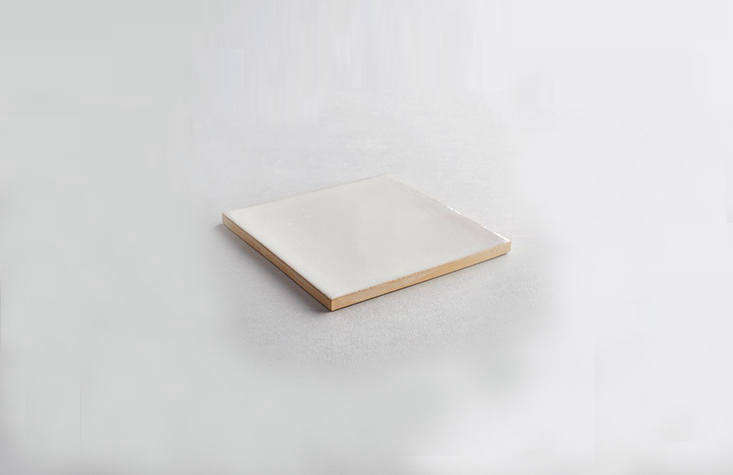 and the company&#8\2\17;s simplest offering, the square white branco tile. 31