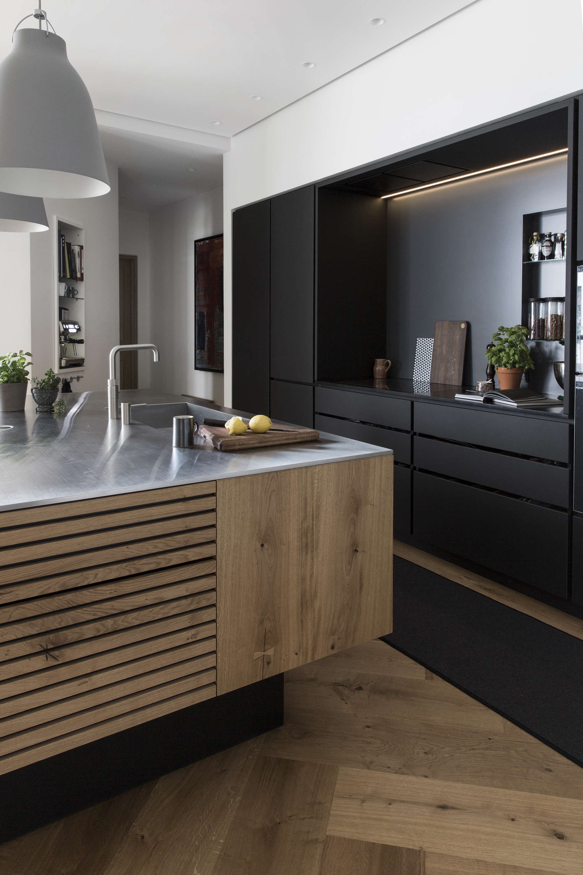 kitchen island with wood slats dinesen wood floor black backsplash denmark gard 19