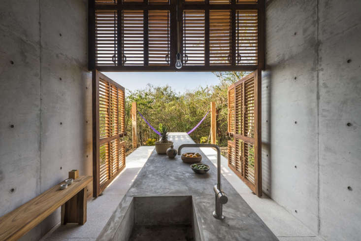at the secluded casa tiny, a walden inspired getaway in mexico, the kitchen ope 19