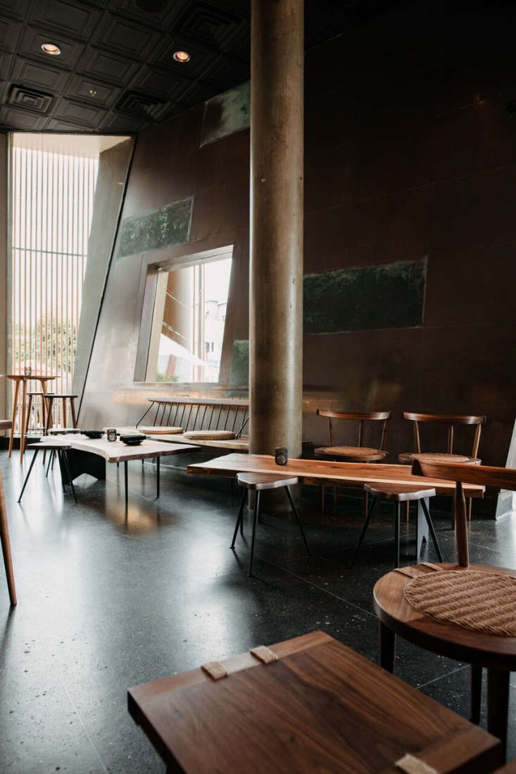 the revamped bar area, complete with sparse tables and spindle back benches. 18