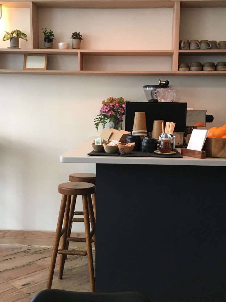 the black painted coffee bar and rough hewn wood floors. l&#8\2\1 21