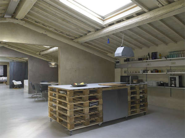 admiring the lofty ceilings and unexpected kitchen island in design renais 19
