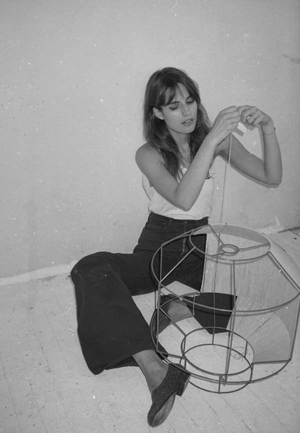 kras at work on one of her hand strung lamps, which were featured at the nyc ma 20