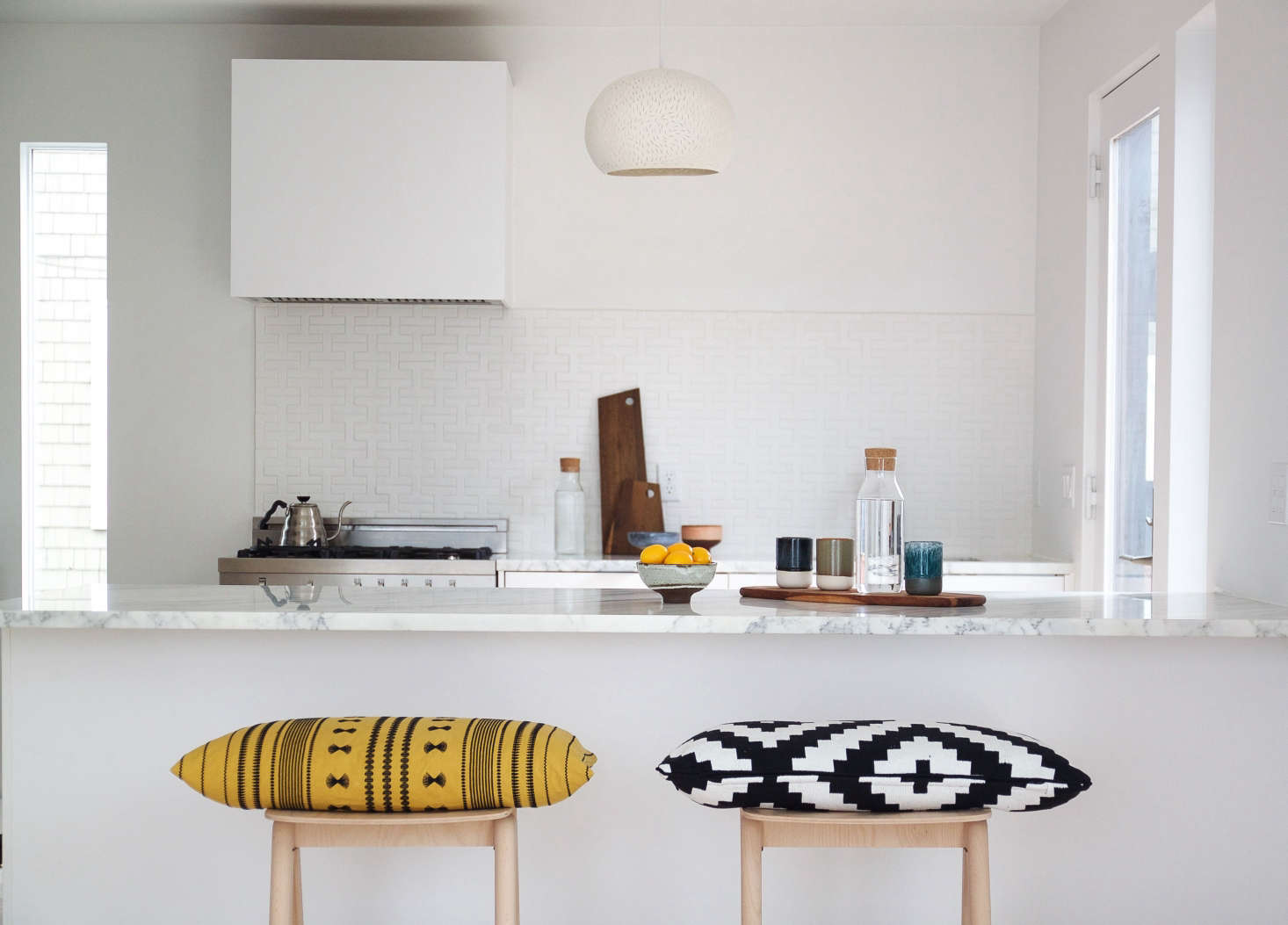 Subtle splashes of color saved the crisp, clean space from becoming too stark.