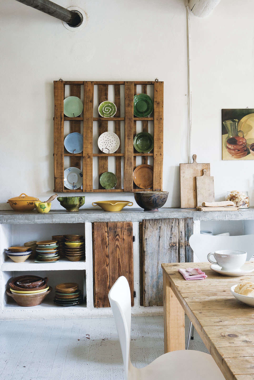 German designer Katrin Arens own kitchen in Italy from Slow Design: Pallet as Plate Rack by Katrin Arens.