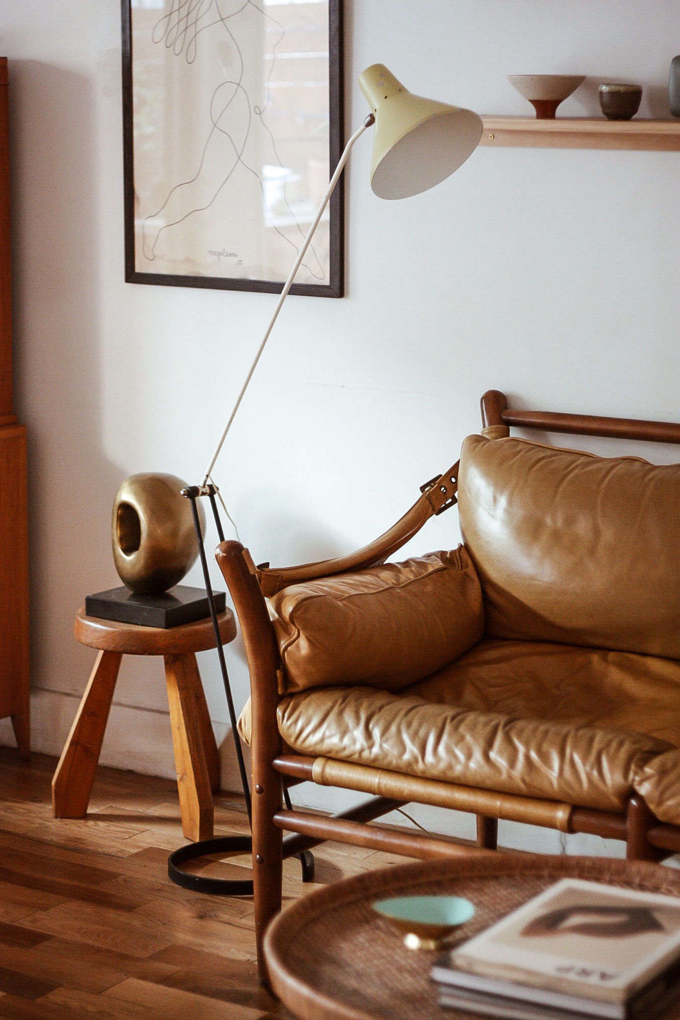 Kirill found many of the items in his home, such as this vintage lamp from Sweden, while traveling abroad in search of one-of-a-kind items for County Ltd.