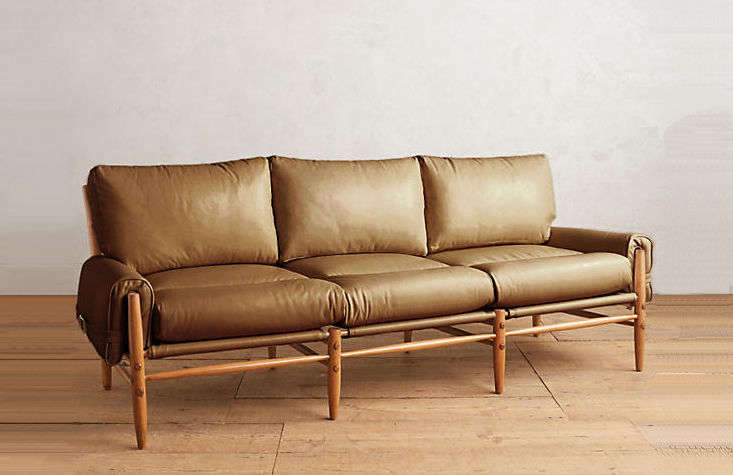 Of similar design: The Premium Leather Rhys Sofa, shown here in caramel, is $5,598 from Anthropologie. N.B.: The sofa is custom-made and will be available to ship on May .
