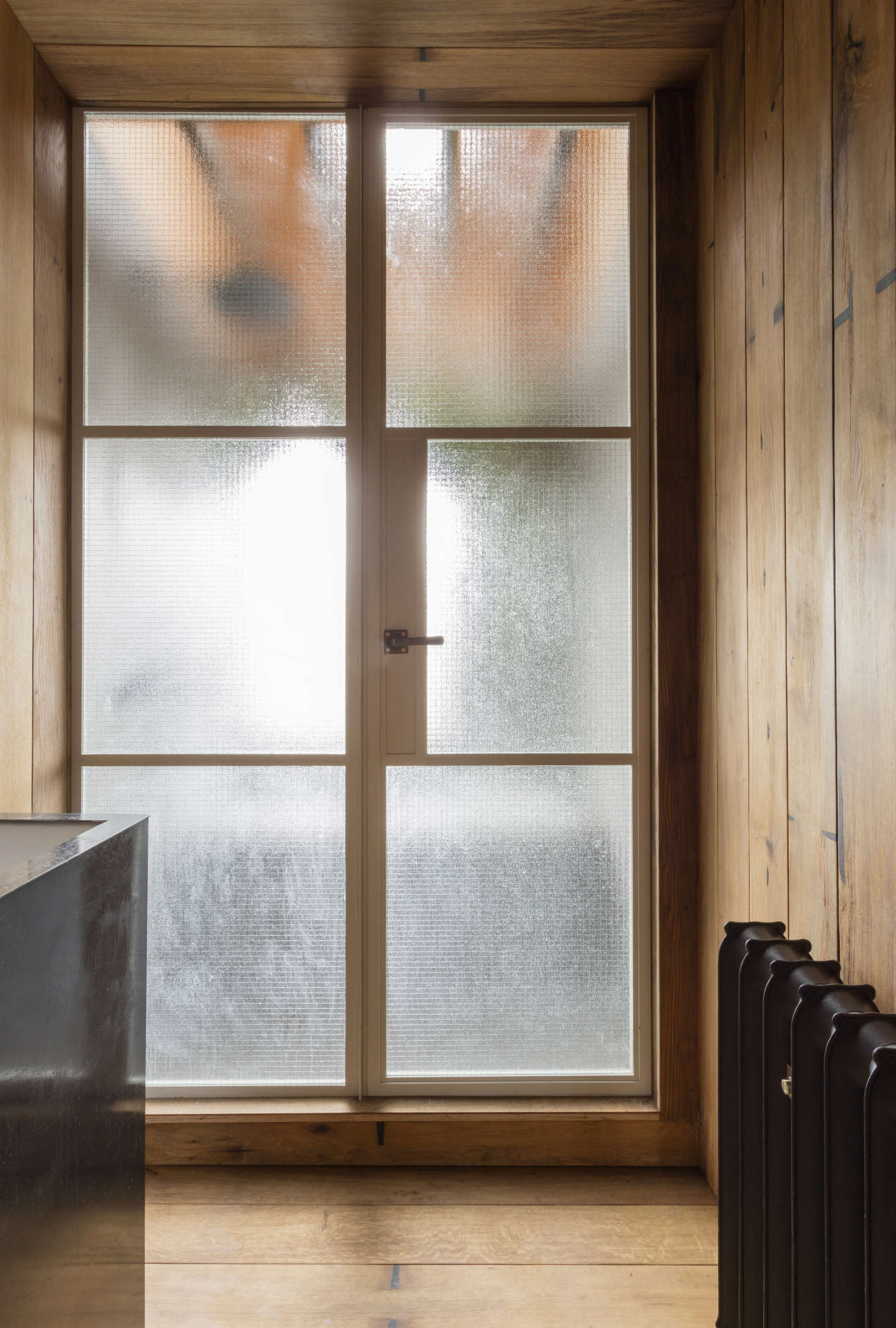 Architect Simon Astridge used fumed oak boards on the floor (and walls and ceiling) of his own London bathroom. See Bathroom of the Week: A Japanese-Style Bath in London, Greenery Included for more.