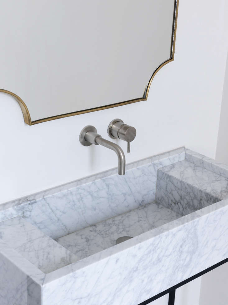 maclean incorporated ledges into the carrara marble basin designed just for the 19