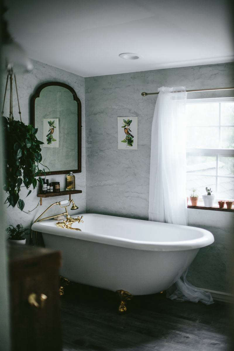 The bath in a sea foam hue by Master of Plaster.