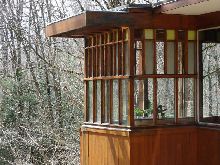 the house is clad in cypress indoors and out, and detailed with stained glass i 18