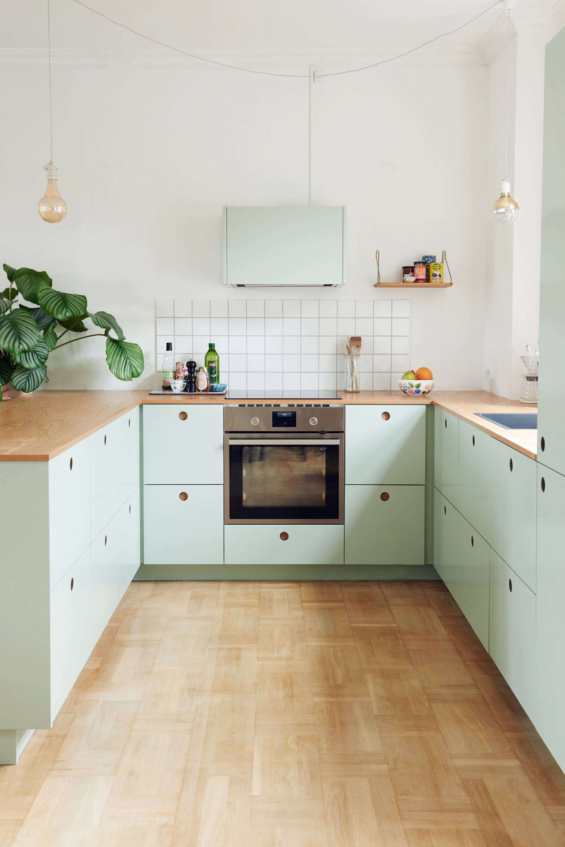 Stylish Ikea hack kitchen with mint green fronts by Reform of Denmark