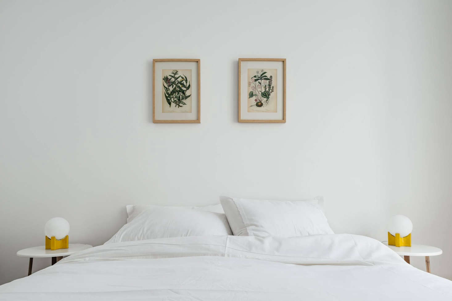 The Lisboans has apartment-style guest suites. Shown here: the Comfort One-Bedroom, vintage botanical prints included. (For a similar look, see Steal This Look: A Portuguese Bedroom with Vintage Charm.)