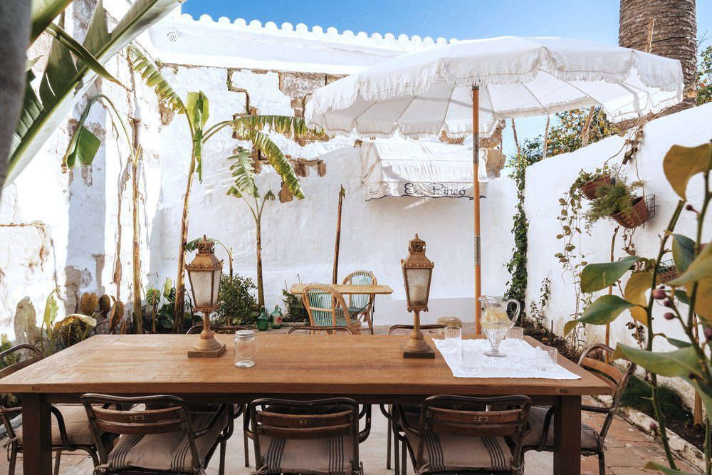 Breakfast is served in the walled patio.